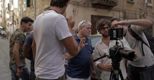 Il regista Gaetano Di Vaio (al centro) nel corso delle riprese di “Largo baracche” (Ansa) (ANSA)