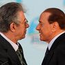 Respinto il pressing della Lega, Berlusconi è alle prese con la partita dei voti alla Camera. Nella foto il leader della Lega, Umberto Bossi (a sinistra) e il premier Silvio Berlusconi (Ansa) 