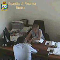 Un fermo immagine tratto da un video della Guardia di Finanza nell'ambito dell'inchiesta 'Dama Nera', Roma, 22 ottobre 2015. Protagonista Antonella Accroglianò, dirigente responsabile del coordinamento tecnico amministrativo di Anas, donna chiave della vicenda denominata la “dama nera”. (Ansa)