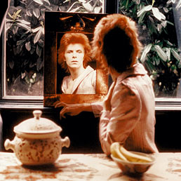 Mick Rock, David Bowie. In Mirror, Beckenham, 1972 © Mick Rock