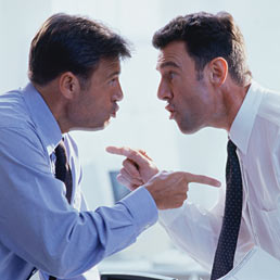 È reato l'insulto sul luogo di lavoro davanti ai colleghi (Corbis)